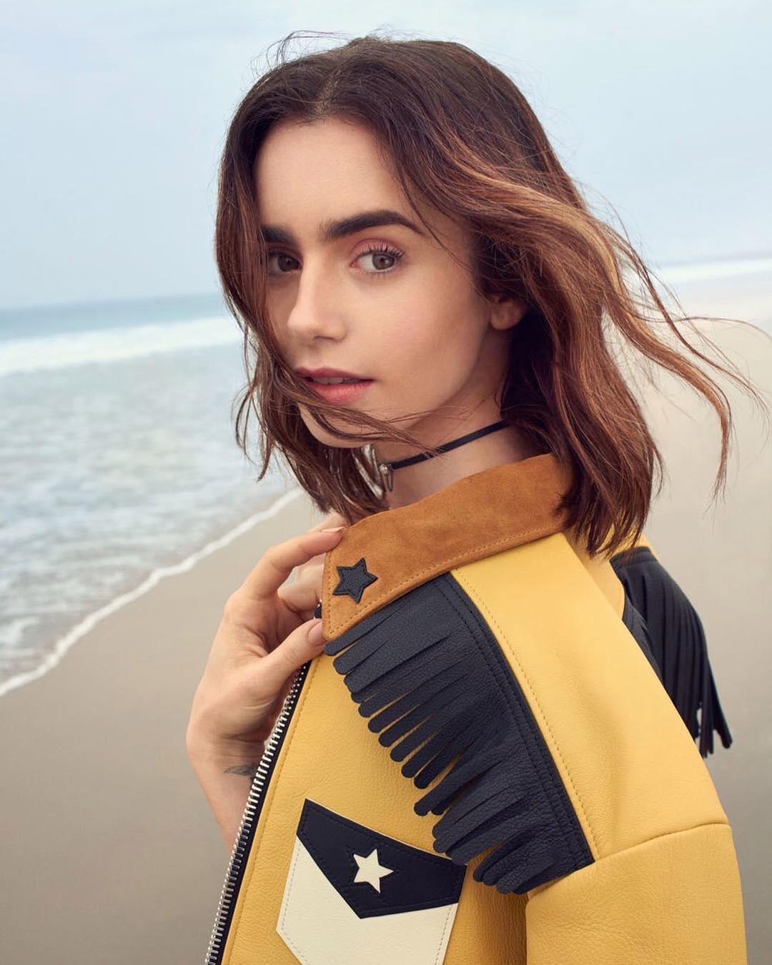 Lily Collins on Beach