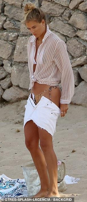 Love Island’s Arabella Chi stuns the fans with her suntanned skin in a tiny bikini as she spends time with Josh Newsham 14