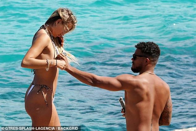 Love Island’s Arabella Chi stuns the fans with her suntanned skin in a tiny bikini as she spends time with Josh Newsham 96