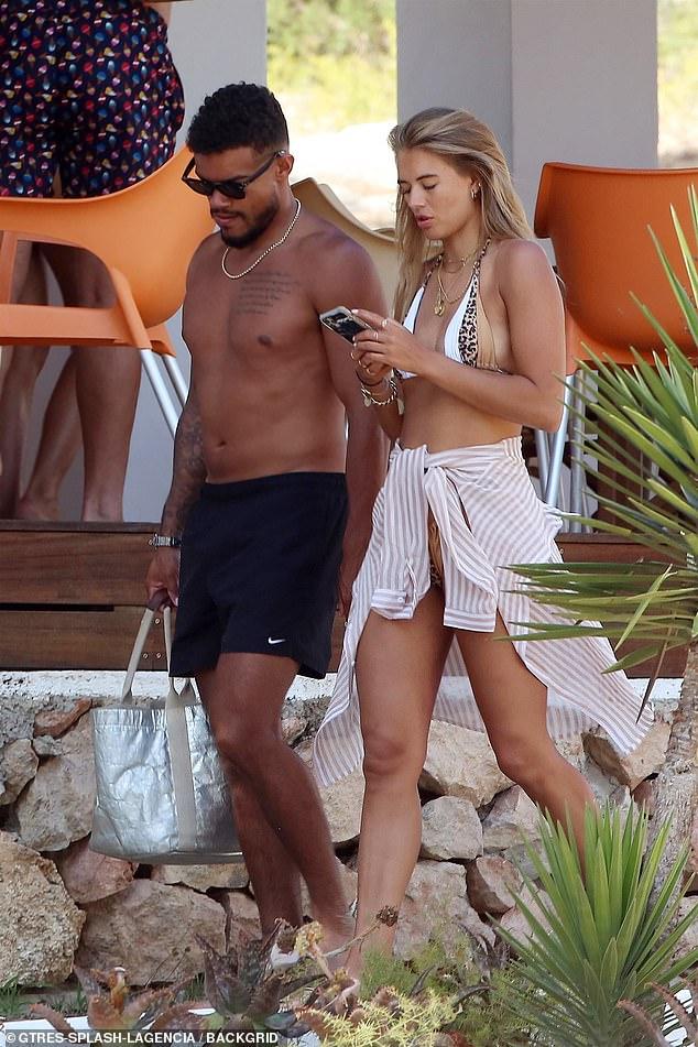 Love Island’s Arabella Chi stuns the fans with her suntanned skin in a tiny bikini as she spends time with Josh Newsham 75