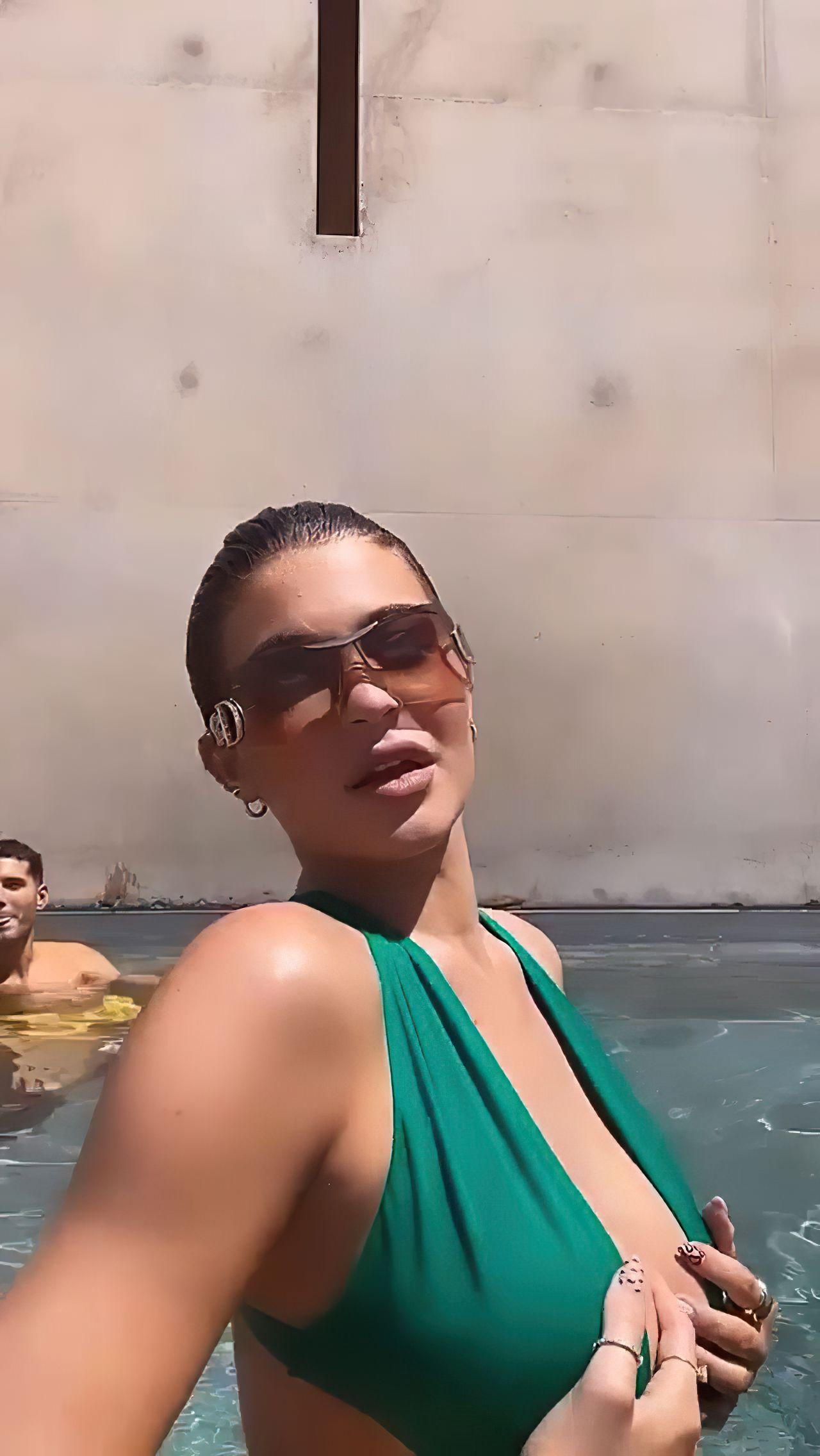 Kylie Jenner looks enthralling in the pool as she flaunts her curves 13
