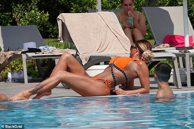 Katie Price Looks Stunning In Skimpy Orange Bikini 175