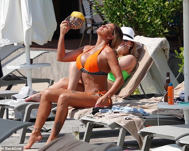 Katie Price Looks Stunning In Skimpy Orange Bikini 106