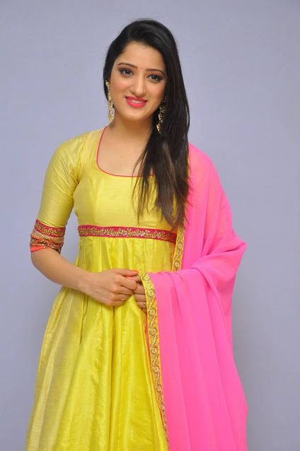 Telugu Cute Girl Richa Panai Photos In Yellow Dress At Audio Launch 10