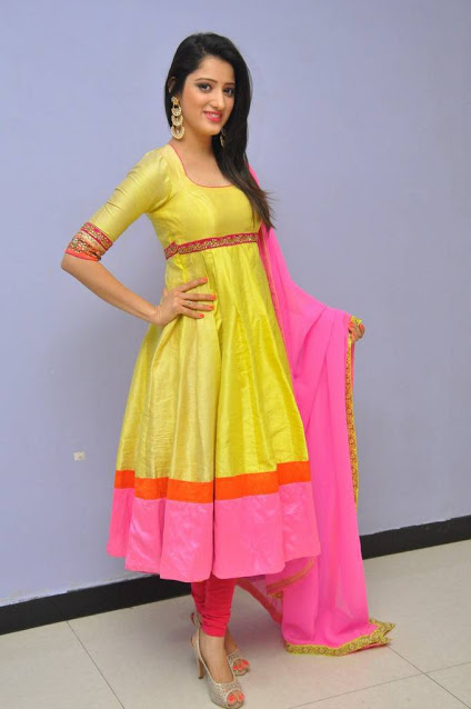 Telugu Cute Girl Richa Panai Photos In Yellow Dress At Audio Launch 15