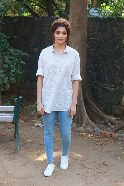 Telugu Actress Ritika Singh Stills In White Shirt Blue Jeans 9