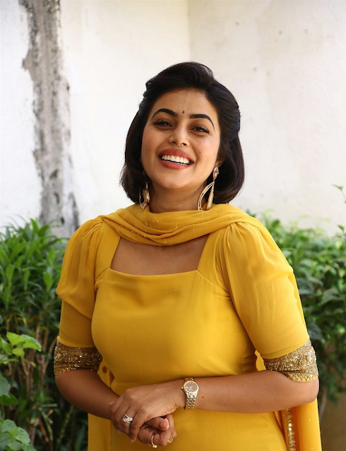 Actress Poorna Latest Cute Photoshoot Pics In Yellow Attire 64