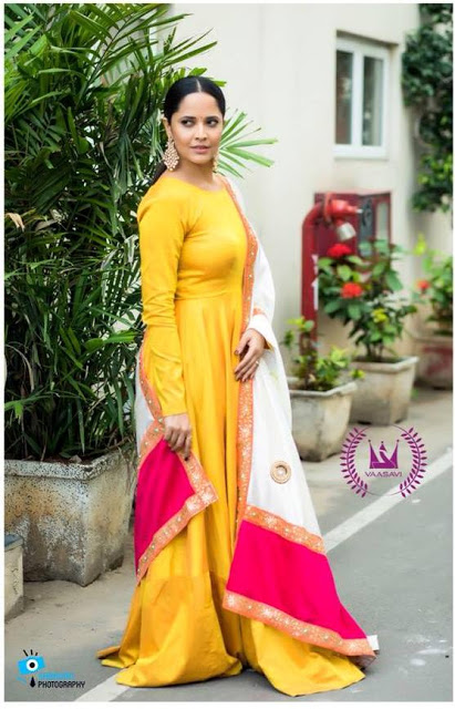 Television Actress Anasuya Beautiful Looking In Yellow Dress 65