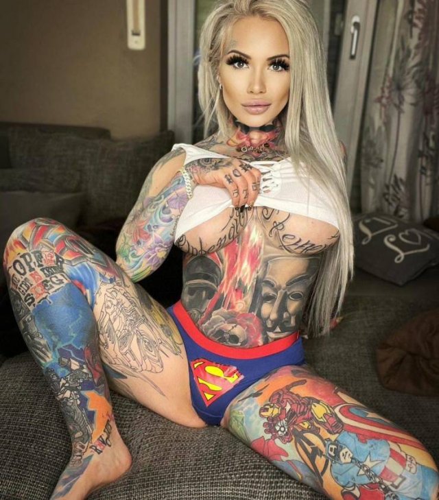 33-Year-Old Mom Covered Her Body In Tattoos Of Her Son's Favorite Heroes (16 pics)
