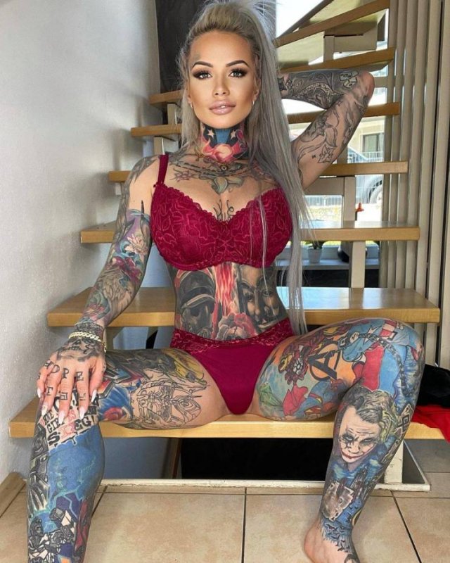 33-Year-Old Mom Covered Her Body In Tattoos Of Her Son's Favorite Heroes (16 pics)